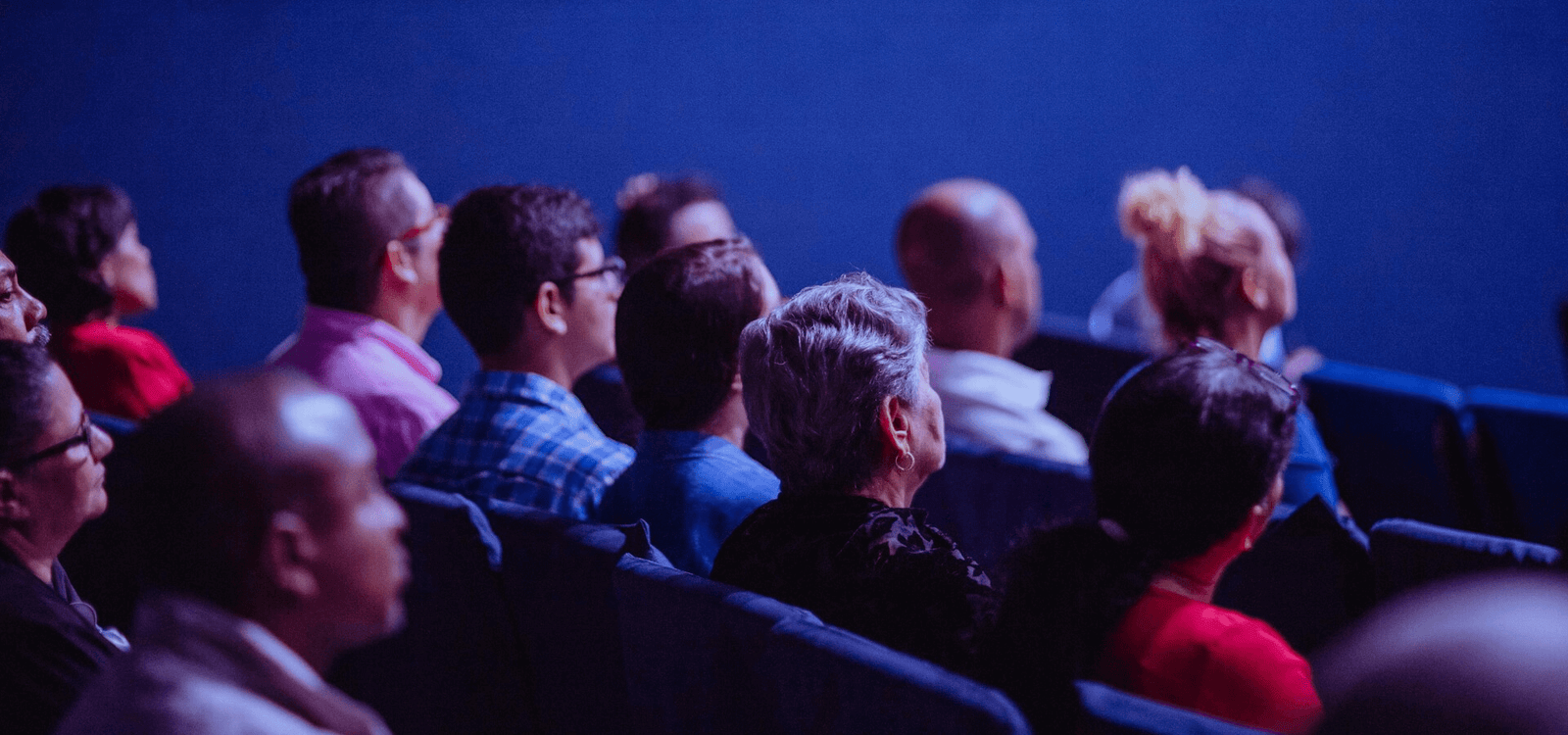 Professional conference speaker presenting to an audience